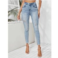 Light wash ripped raw hem skinny jeans s