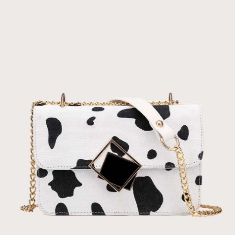 Mini cow print chain crossbody bag