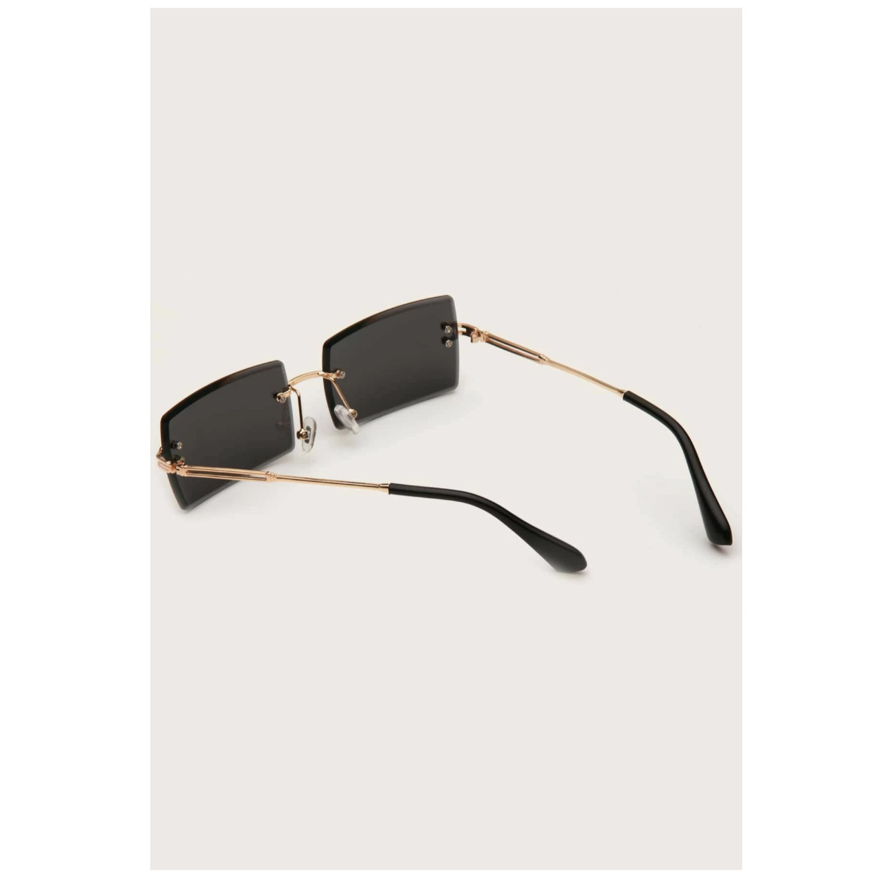 Rimless sunglasses with case golden frame with grey colour